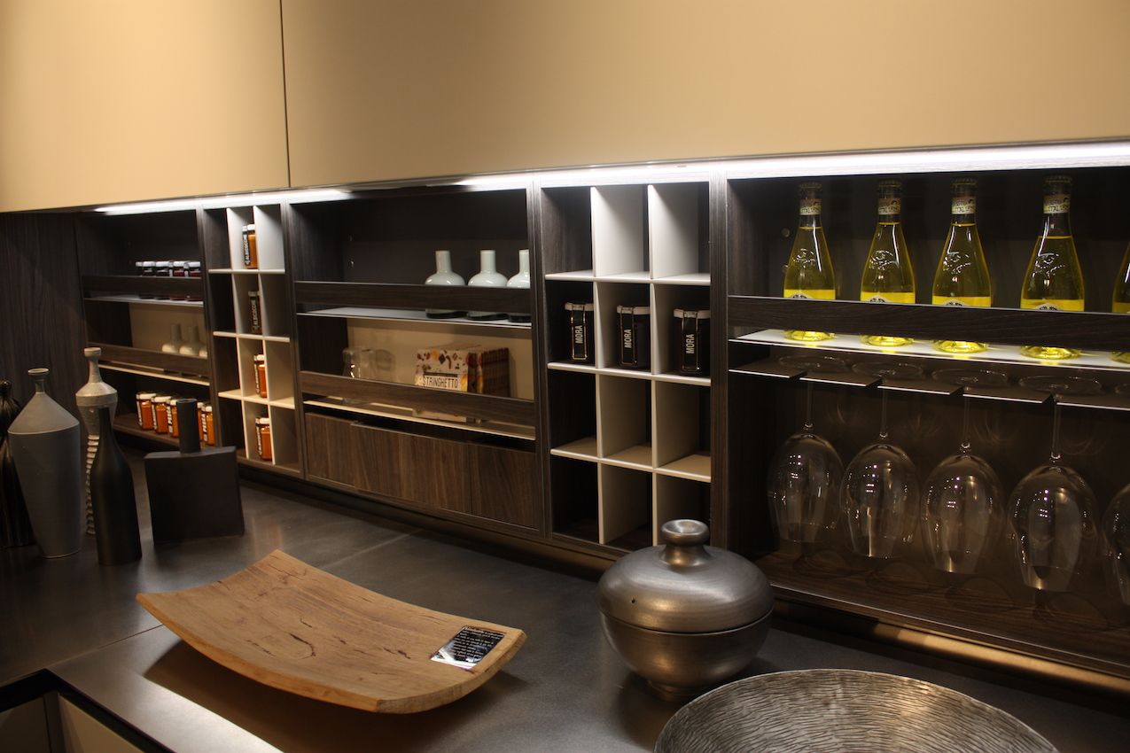 This modular version includes hanging racks for stemware, shelving and cubby holes.