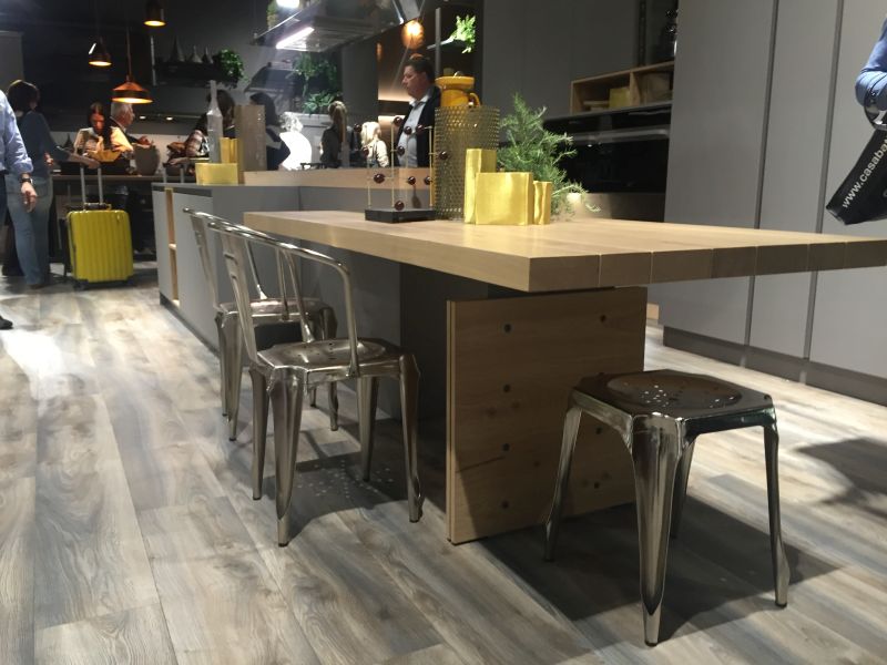 Floating kitchen island extension and stainless steel chairs