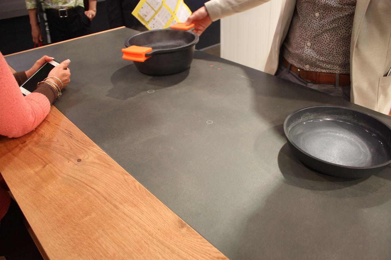 Gatto has an induction cooktop that has a perfectly smooth surface and no knobs.