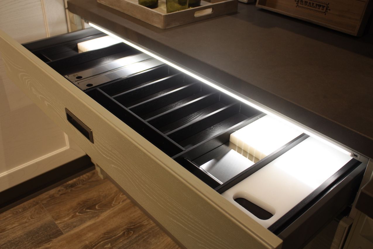 Lighted drawers are a must have in new kitchens. This design is from Arrex.