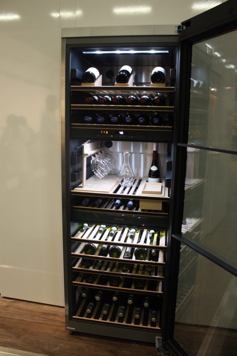 Miele's sophisticated wine tower includes serving space.