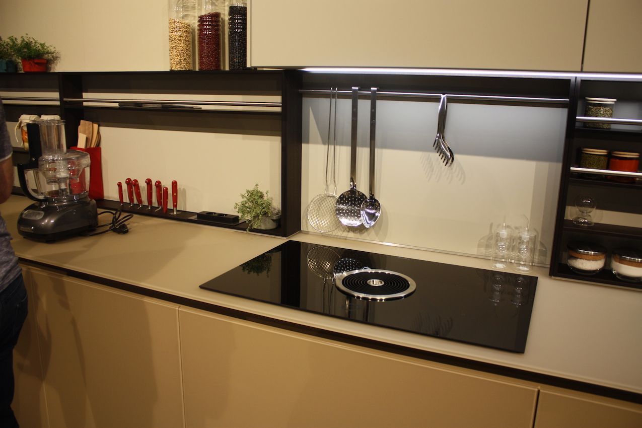 Customized, modular backsplash pieces increase storage options.